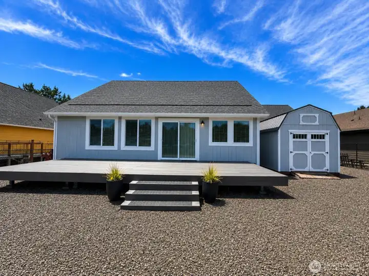 Large newer deck, additional storage shed or golf cart storage