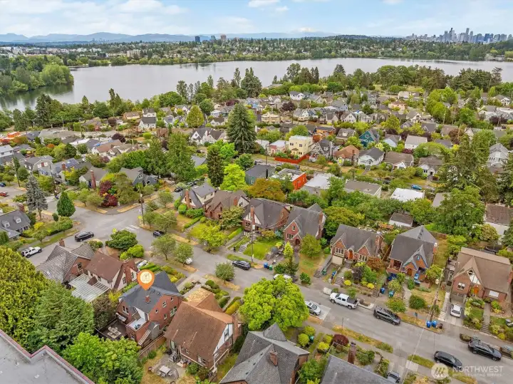 Aerial photo looking south. You can see Green Lake from this photo and the city scape of downtown Seattle. Just a couple of blocks to Green Lake & everything the Green Lake neighborhood has to offer! 93 bike score & 76 walk score. And only minutes to downtown & Amazon.