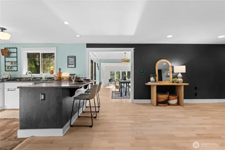 Kitchen opens straight to the dining room and bright living room