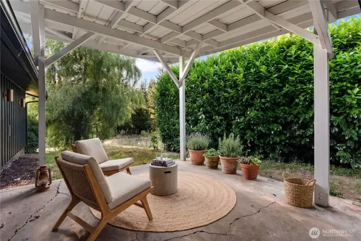 Covered patio off the garage Virtually Staged