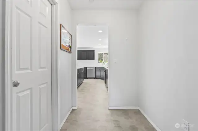 Space + pantry between kitchen & dining room