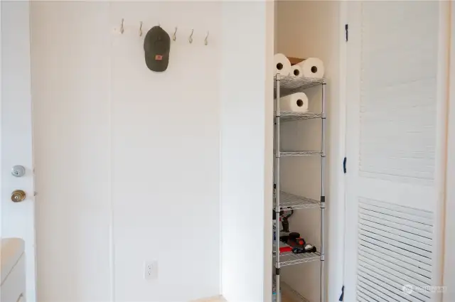 Laundry storage nook.