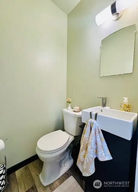 Half bath located off bonus room.