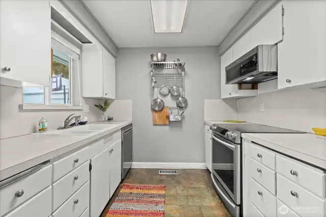 Kitchen offers newer appliances.