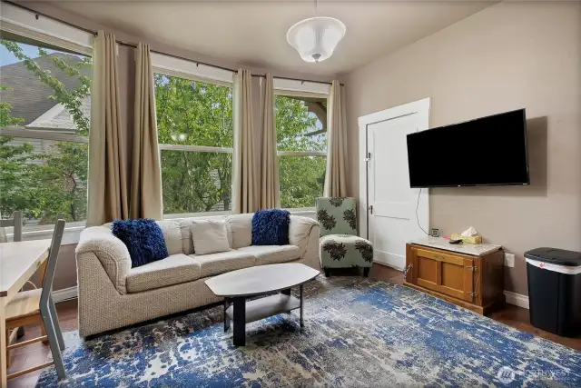 The living room space in Unit B (1 Bedroom)