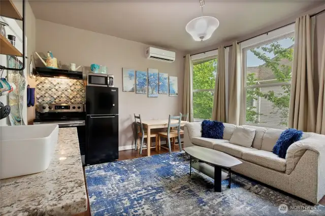 This is the living room and kitchen area of Unit B, a 1 bedroom/1 bath unit.