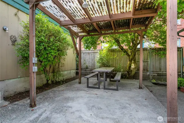 Outside is a covered patio that is shared by all Units.