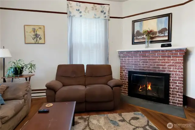 Living Room in Unit A with hardwood floors.