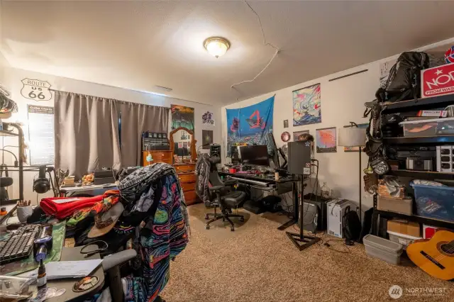 Upper-level bedroom 6.