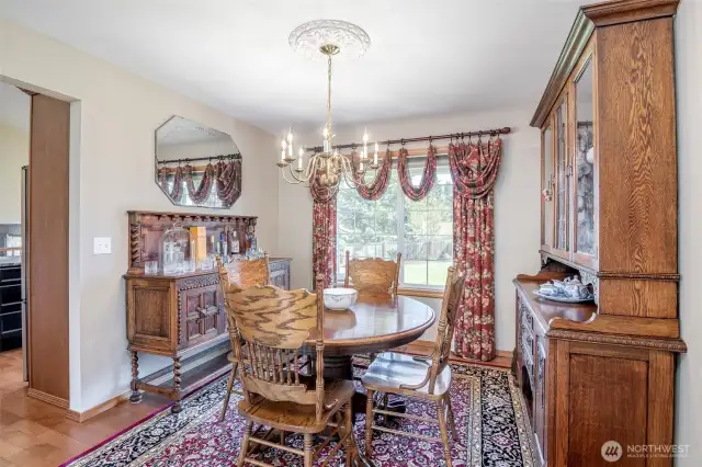 Formal dining room off kitchen could potentially be framed in to create a den/office space.
