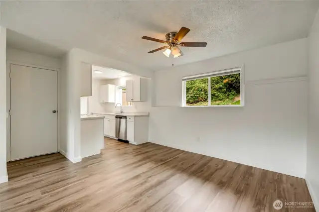 Dining nook with garage access, open to the kitchen