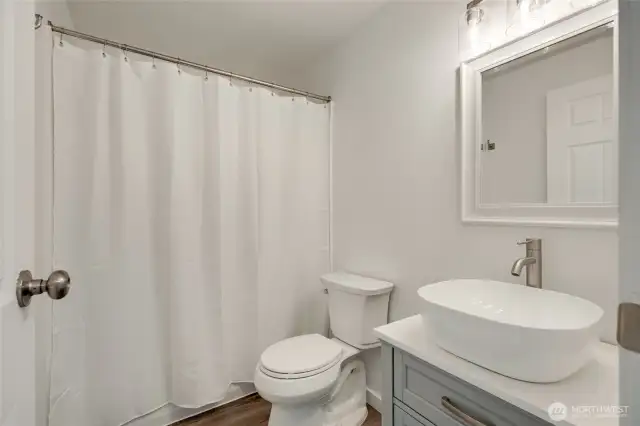 Refreshed bath with new vanity and flooring