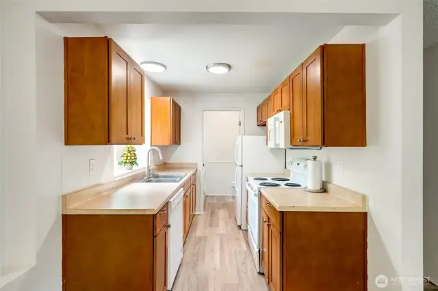 Warm kitchen with lots of cabinet and counter space