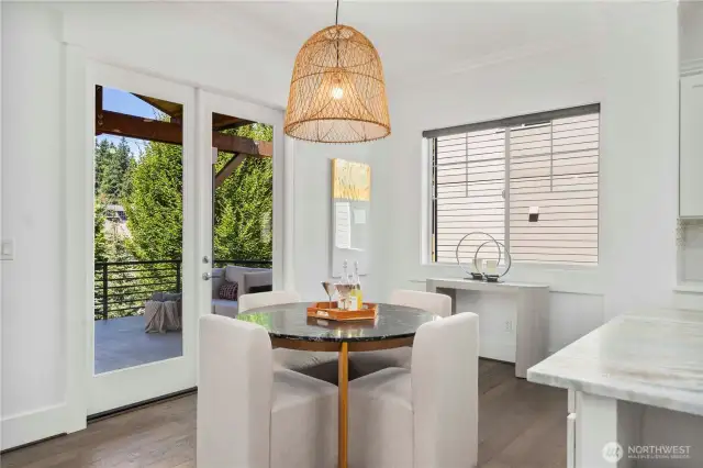 Breakfast nook next to living and kitchen