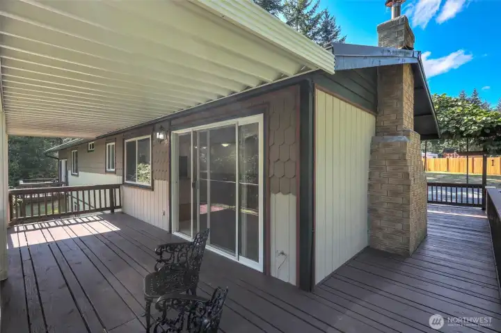 Oversized Slider to Huge Covered deck that wraps most the Home!