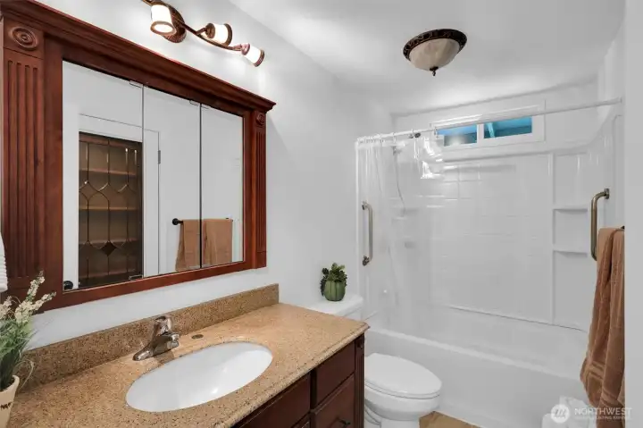 Refreshed Upper full bath.