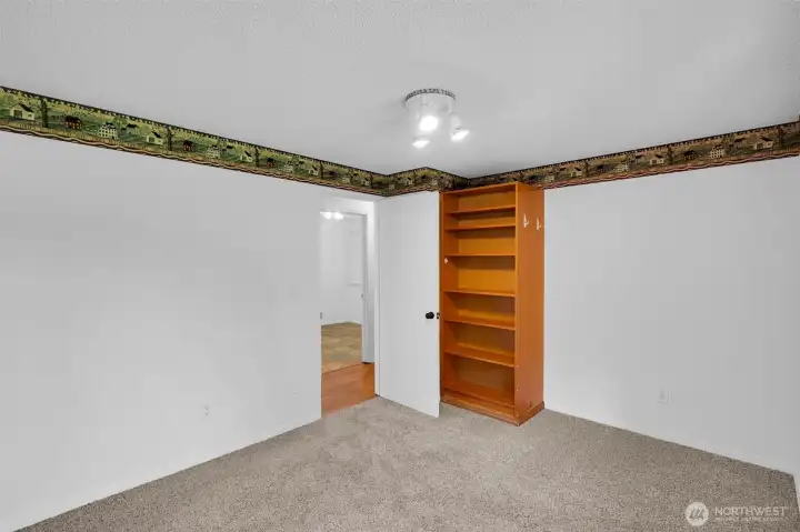 Big bedroom on upper floor.