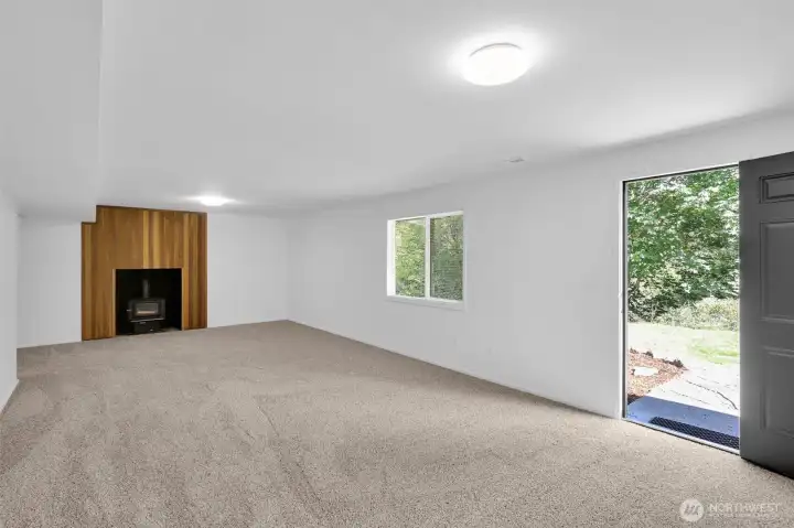 Huge Lower level Great room with separate entrance and wood stove.  All new paint and carpeting!