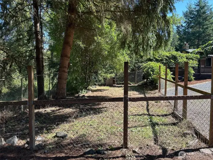 Great large fenced dog run with 2 gates, access from front porch!