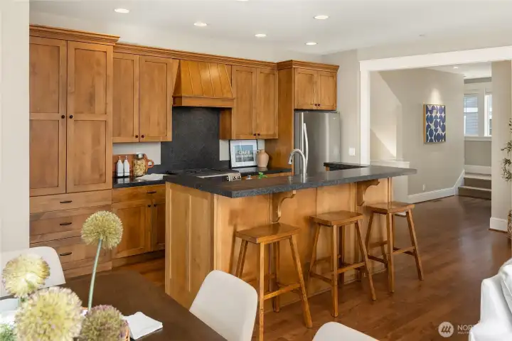 Entertaining is easy whether casually dining at the kitchen counter or around the table in the generous dining area.