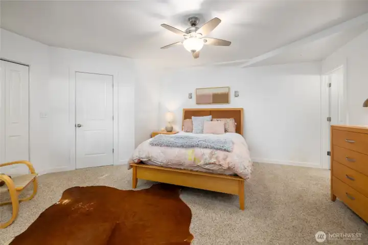 The lower level features a second ensuite bedroom with large closets and a stylishly updated ¾ bath.    Pick your favorite level for your primary retreat.