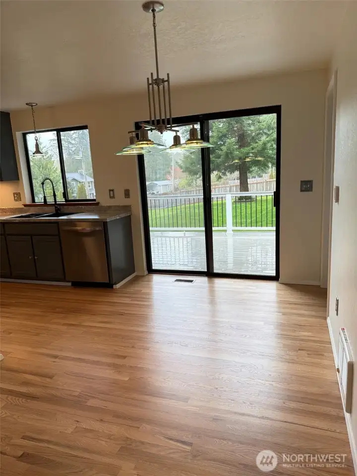 Dining room area off kitchen and flows to the rear deck area