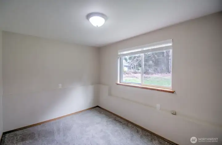 Bedroom 2 located on lower level