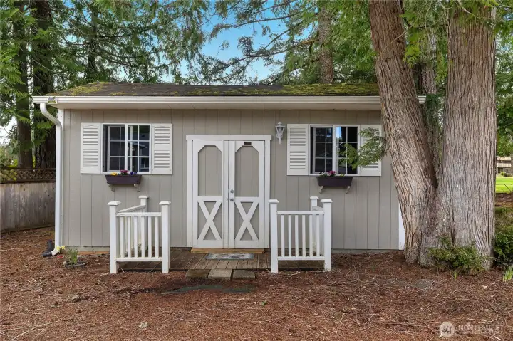 Shed that opens up with electricity inside.  Lots of options for this she shed!