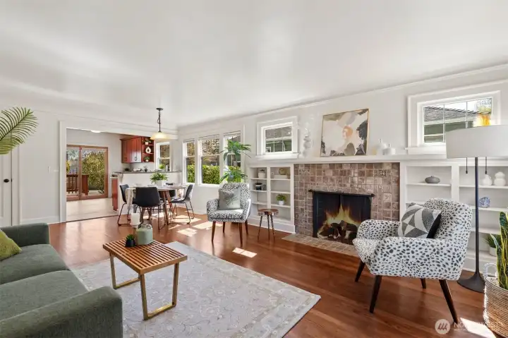 Enjoy the charm with built ins, original hardwoods, and wood burning fireplace.