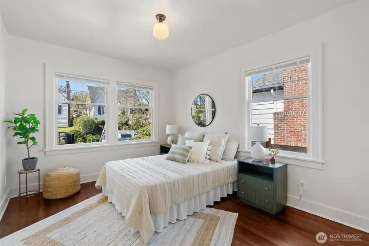 Spacious bedrooms both with walk in closets and original hardwoods.