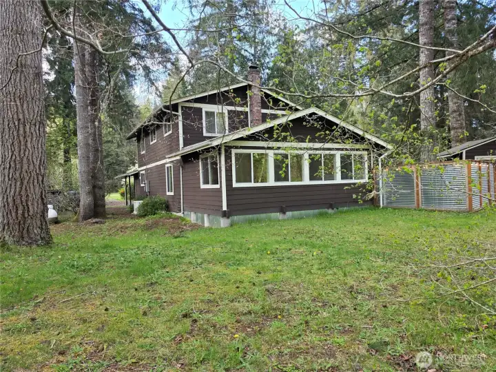 The front of the house faces the Tahuya River.