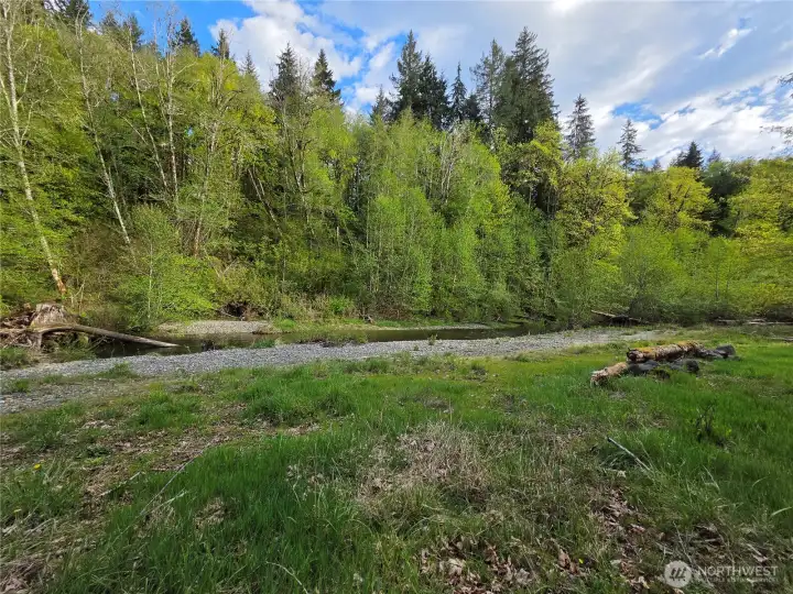 The house lot has 91' of waterfront and the extra lot 12 has 103" of waterfront for a total of 194.