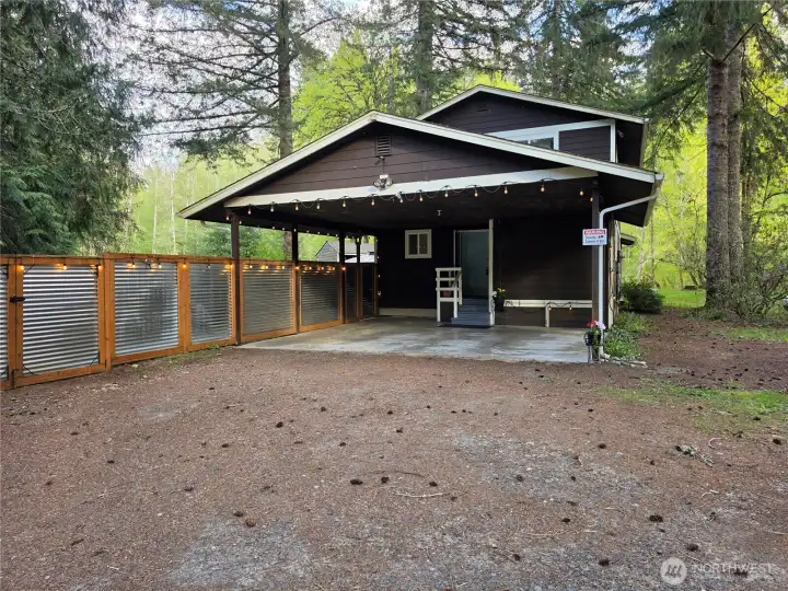 When you pull into the home you have the option of parking 2 cars in the car port or...