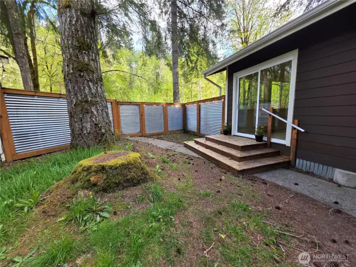 The deck is lovely right off the enclosed sun room.