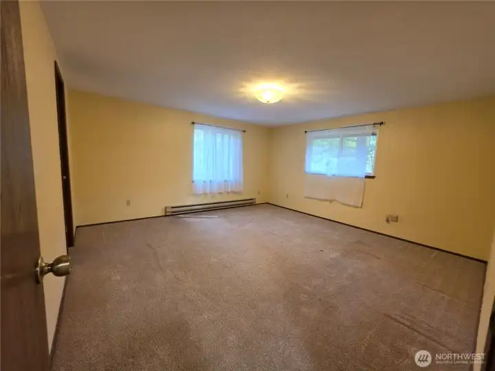 The primary upstairs bedroom is huge with a walk-in closet and it overlooks the river.