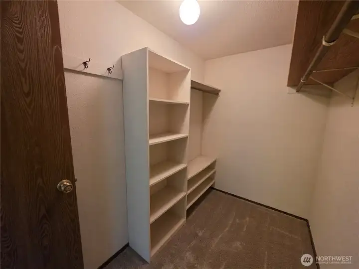 Both bedrooms upstairs have huge walk-in closets with shelves.