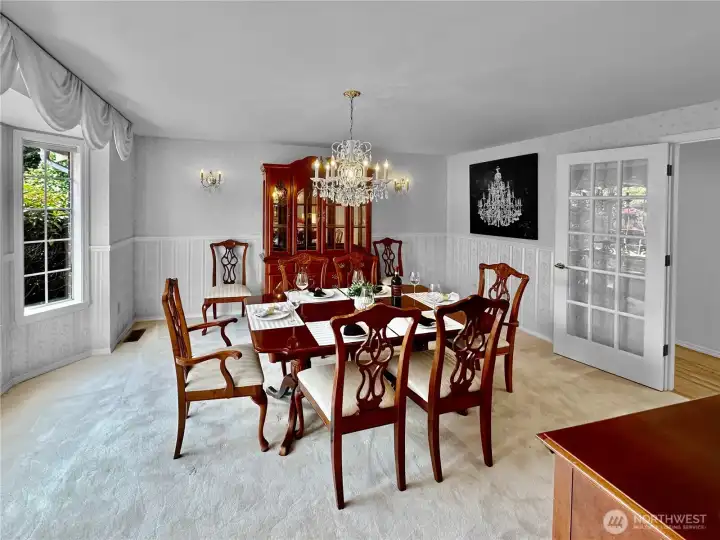Just off the left of the entry is stunning formal dining room with plenty of room for family and friends.