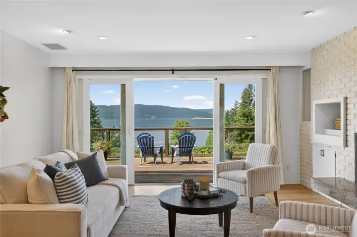 View from kitchen of family room that leads the deck. View from kitchen of family room that leads the deck.