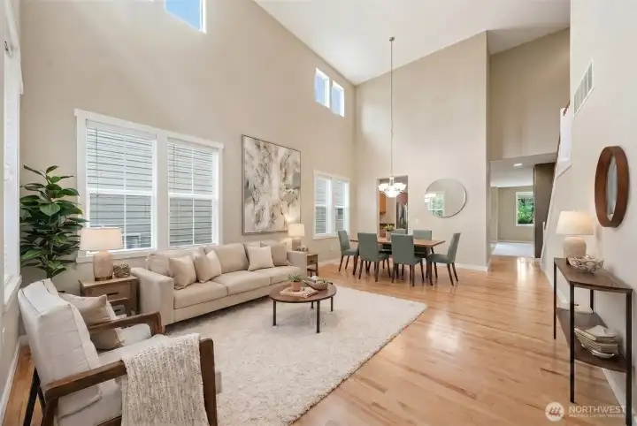 Virtually staged front living and dining area.