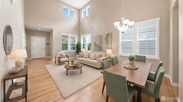 Two stories of windows let in natural light. Virtually staged.
