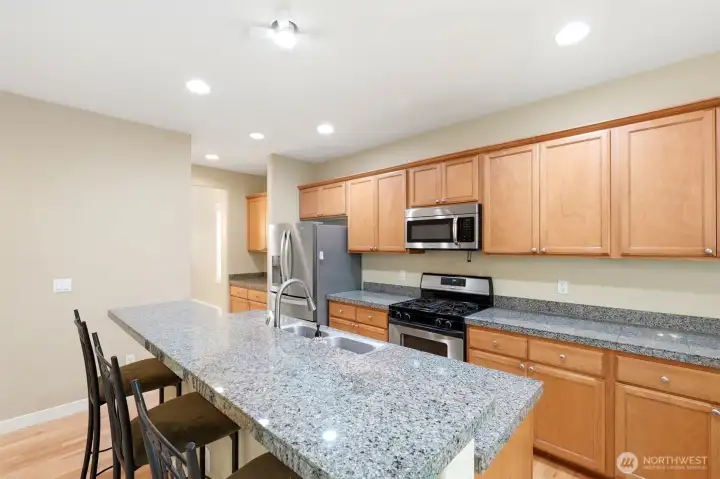 A butler's pantry and walk-in pantry between the formal dining area and kitchen.