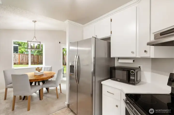 The kitchen is ideally located and packs a punch with its wealth of fixtures.