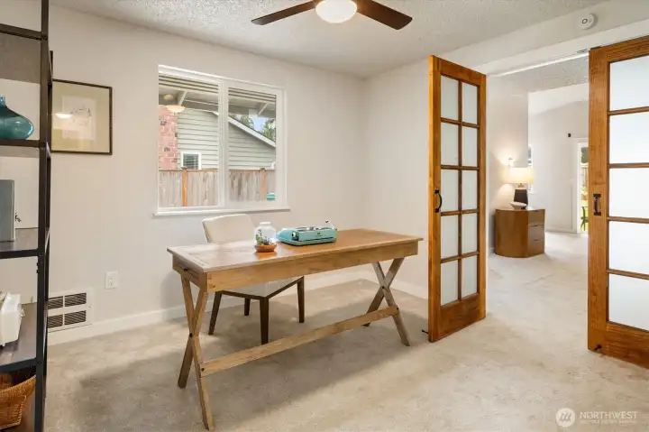 This home office (or bedroom) is the ideal intersection of productivity and comfort.
