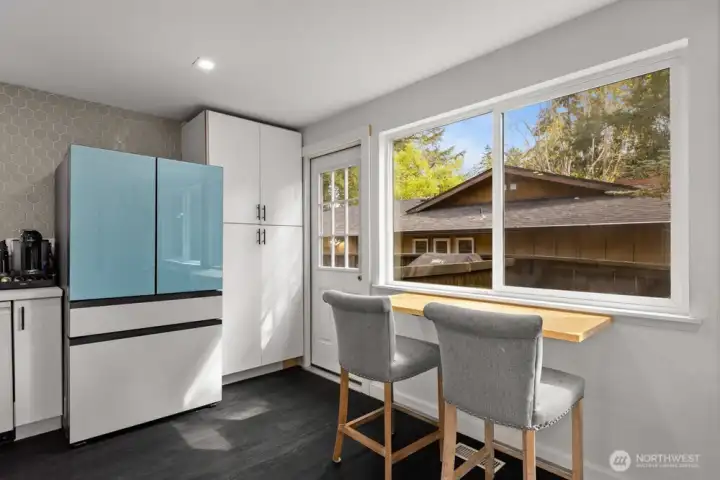 With an eat-in bar, this kitchen is both stylish and functional. With an eat-in bar, this kitchen is both stylish and functional.