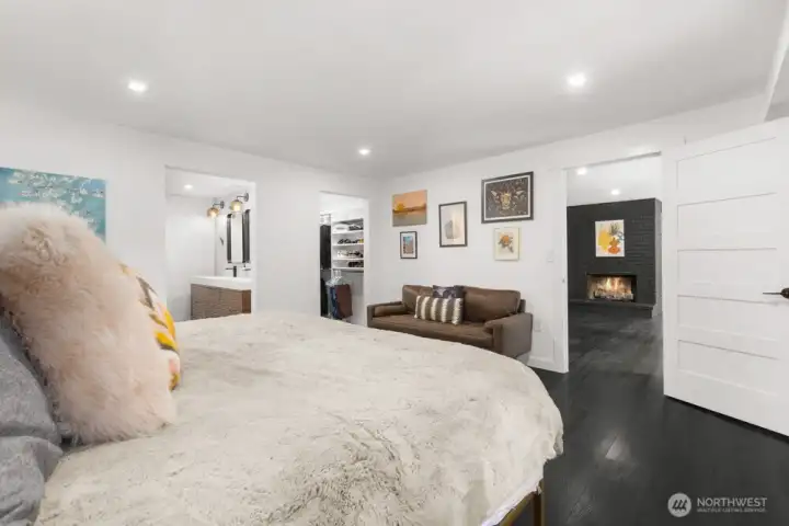 A peaceful retreat featuring a spacious walk-in closet and a beautifully tiled bath A peaceful retreat featuring a spacious walk-in closet and a beautifully tiled bath