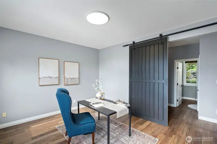Office with sliding barn door