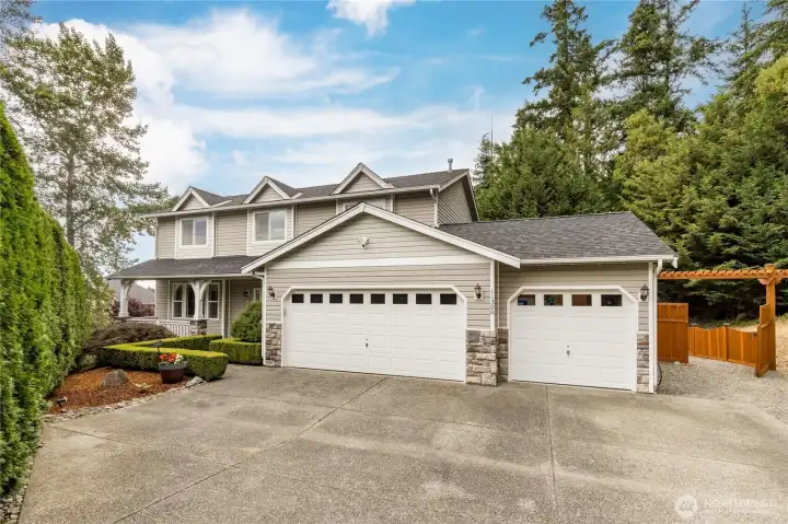 Exceptional privacy meets convenience. Tucked away on a quiet cul-de-sac and bordered by serene HOA greenbelt on three sides