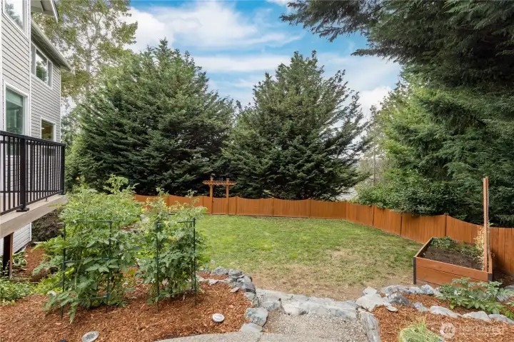 Mature trees in the greenbelt provide a tranquil border to your property