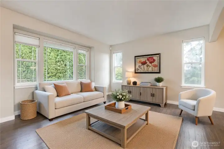 Spacious living room with bright windows
