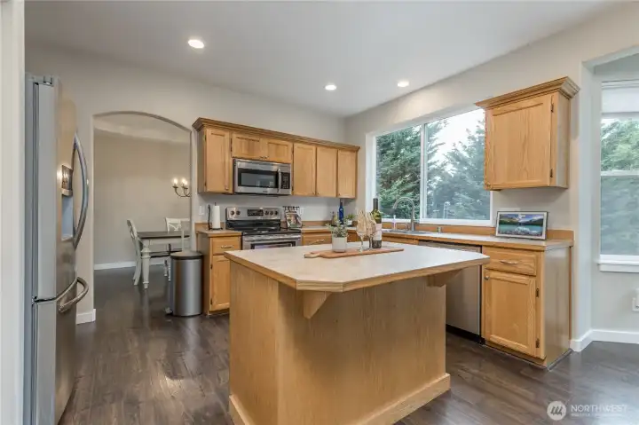 Large kitchen offers a center island for prep space or counter seating